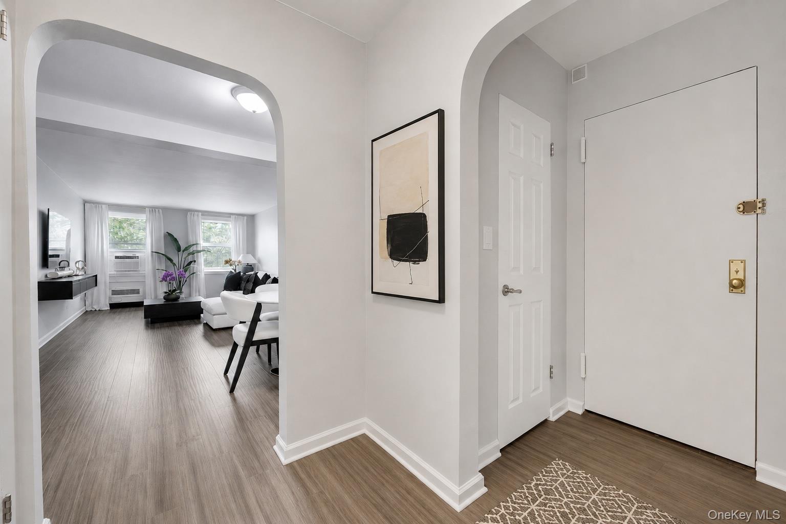 765 Bronx River Road, Unit 4A Bronxville, NY 10708 - Photo 3 of 15 Welcoming entry with stylish city-inspired design.