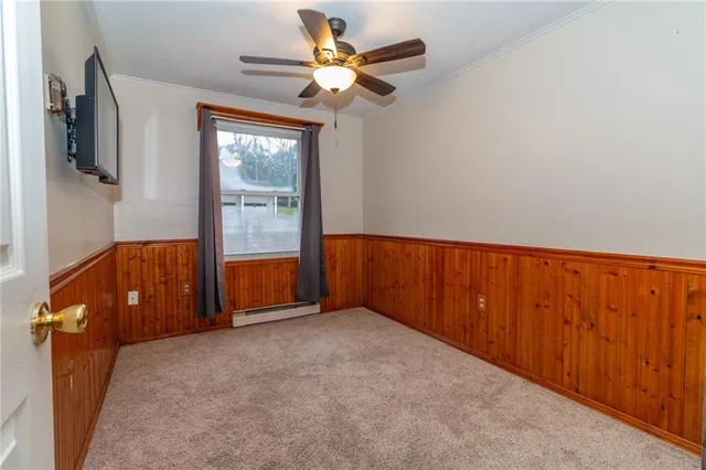 an empty room with fan