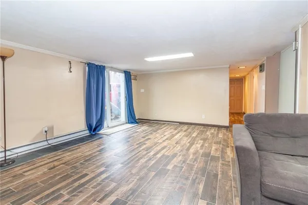 a view of livingroom with furniture and wooden floor
