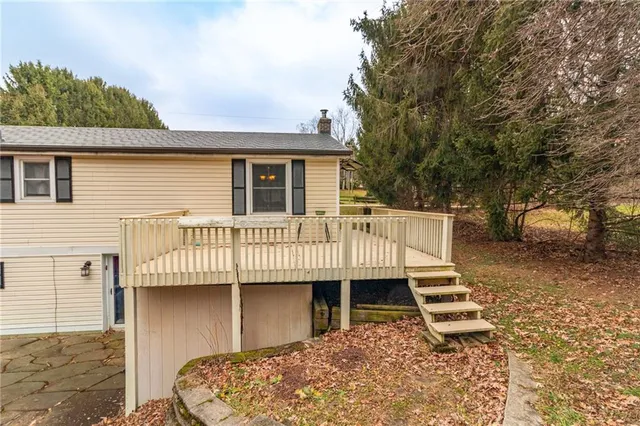 front view of a house with a deck