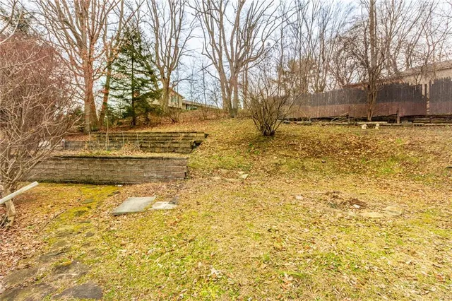 a view of yard covered with snow