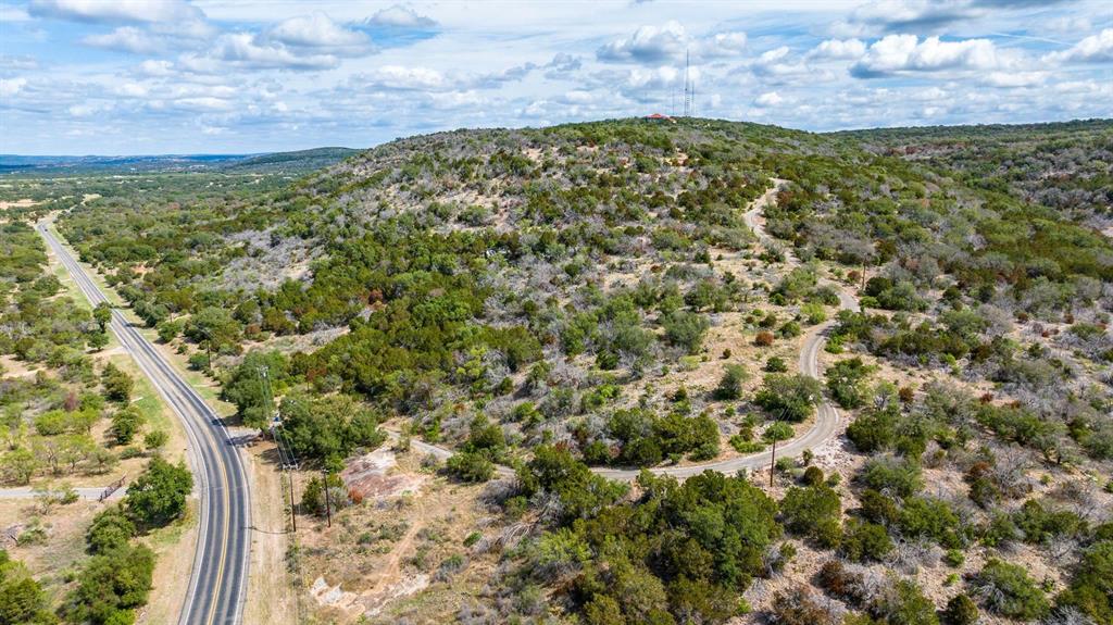 Undisclosed Address Burnet, TX 78611 - Photo 12 of 29 a view of a yard with an outdoor space