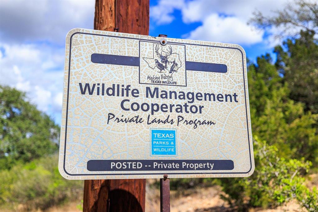 Undisclosed Address Burnet, TX 78611 - Photo 13 of 29 a sign that is on top of a building