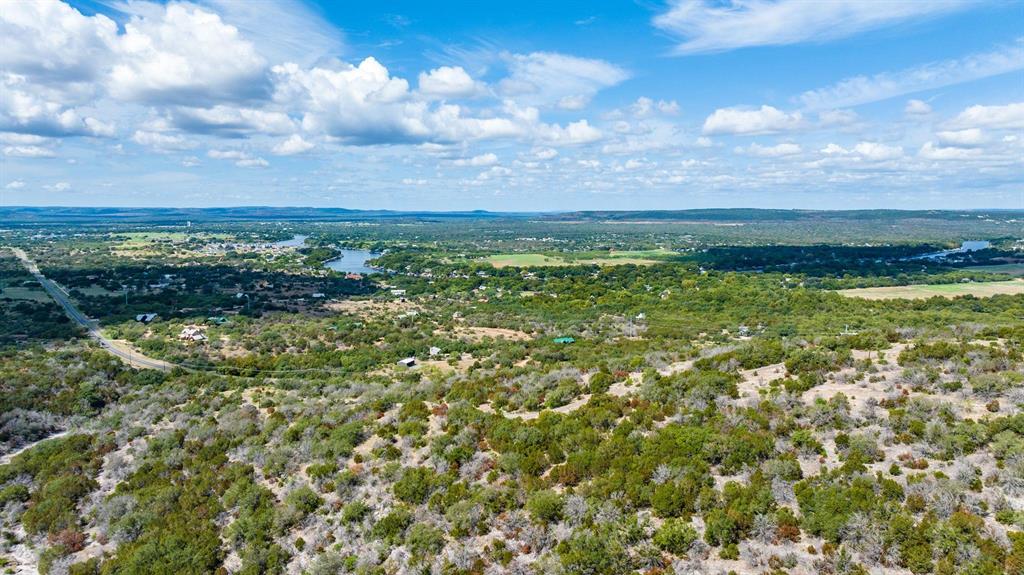 Undisclosed Address Burnet, TX 78611 - Photo 14 of 29 a view of a bunch of trees and houses