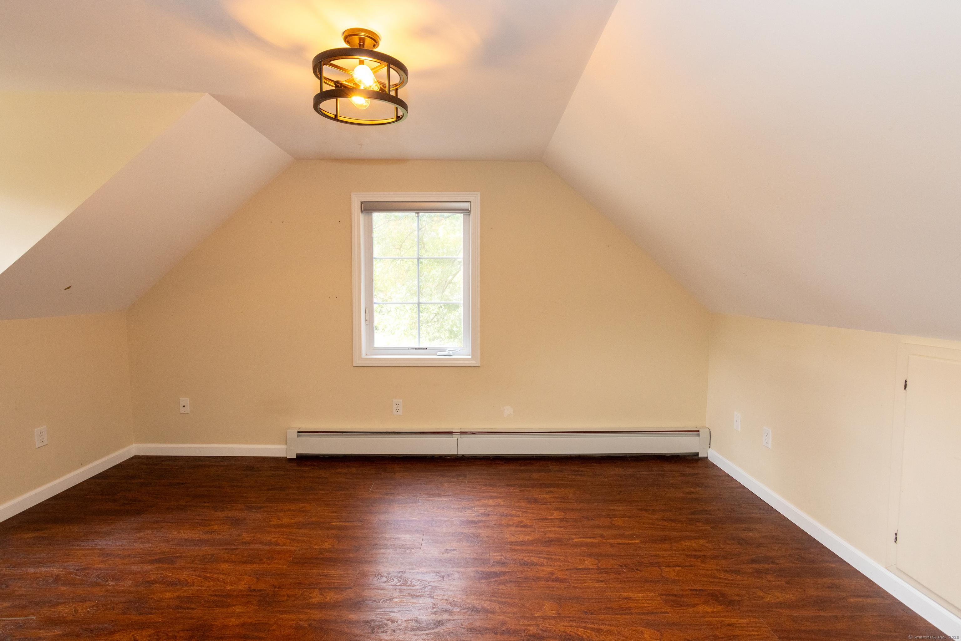 80 Noble Street Hamden, CT 06514 - Photo 12 of 22 wooden floor in an empty room with a window