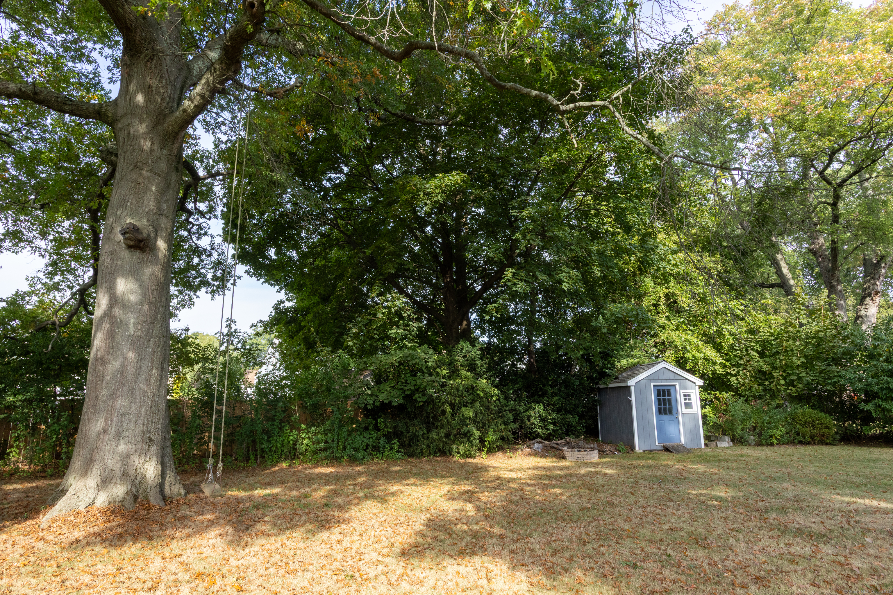 80 Noble Street Hamden, CT 06514 - Photo 20 of 22 a view of a house with a tree and a tree