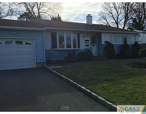 21 Albemarle Road Colonia, NJ 07067 - Photo 1 of 22 a front view of a house with garden