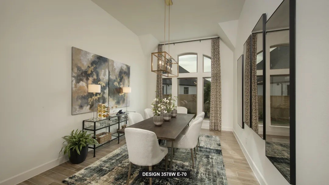 5302 Dream Court Manvel, TX 77578 - Photo 7 of 20 a view of a dining room with furniture window and wooden floor