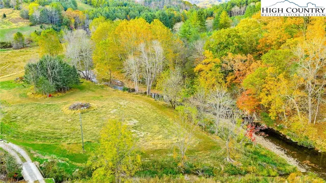 a view of yard with swimming pool