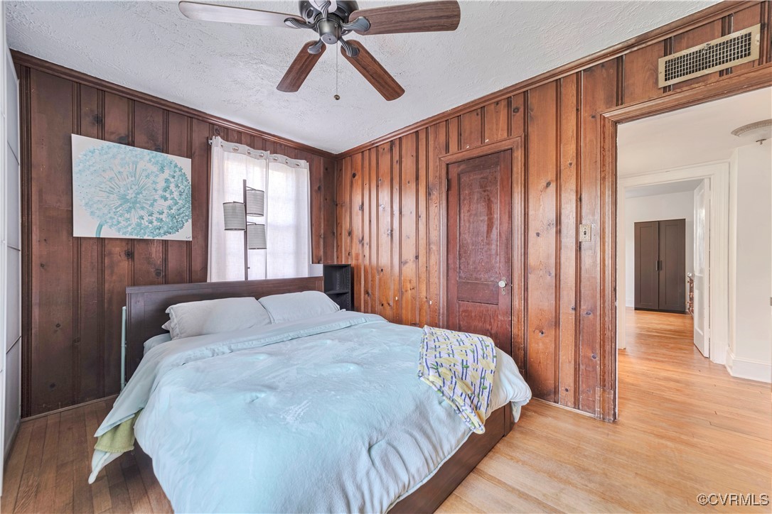 1908 Seddon Road Richmond, VA 23227 - Photo 21 of 34 Bedroom featuring light wood floors and closet