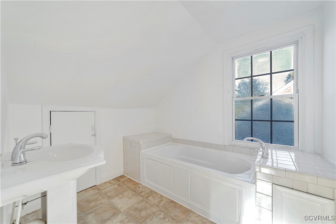 1908 Seddon Road Richmond, VA 23227 - Photo 30 of 34 Upstairs/Primary Bathroom with a bath and lofted c