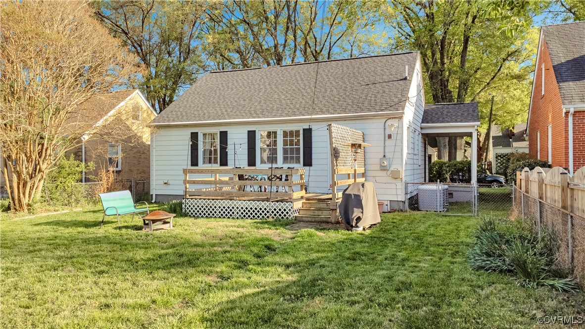1908 Seddon Road Richmond, VA 23227 - Photo 6 of 34 Rear view of property with a fire pit, a wooden de