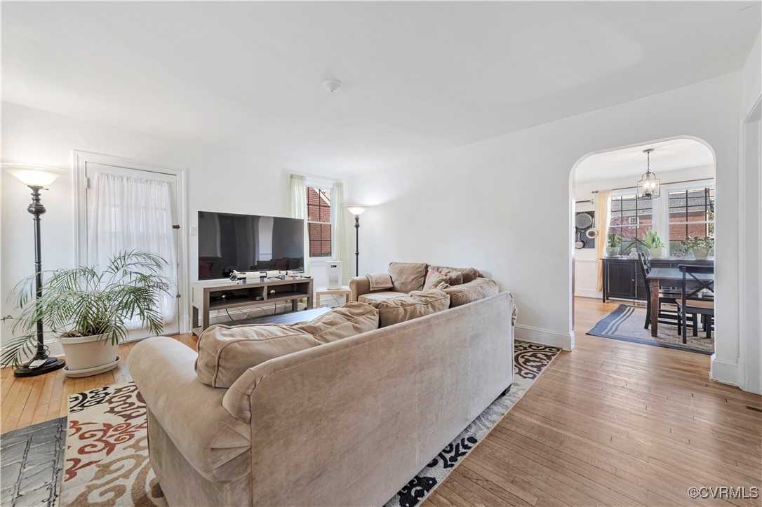 1908 Seddon Road Richmond, VA 23227 - Photo 9 of 34 Living area with arched walkways, baseboards, and