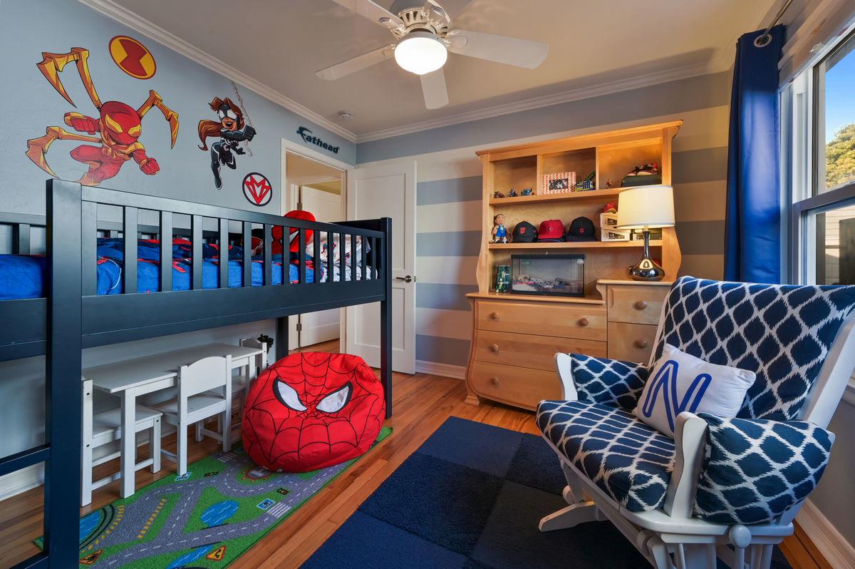 120 Ottawa Street San Mateo, CA 94401 - Photo 14 of 20 a living room with furniture a rug and a book shelf