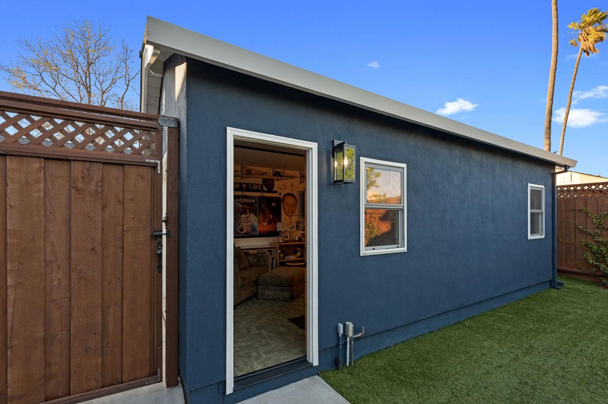 120 Ottawa Street San Mateo, CA 94401 - Photo 15 of 20 a backyard of a house with barbeque oven and glass table