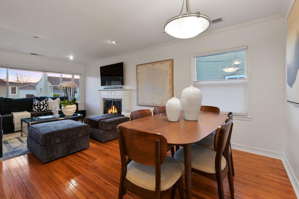 120 Ottawa Street San Mateo, CA 94401 - Photo 5 of 20 a living room with furniture a fireplace and a flat screen tv