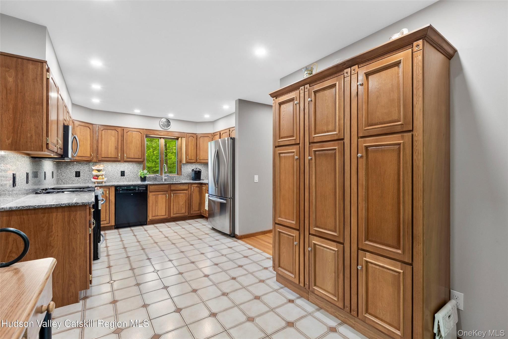 48 Deer Park Road Cairo, NY 12473 - Photo 12 of 33 a kitchen with stainless steel appliances granite countertop a refrigerator and a stove top oven