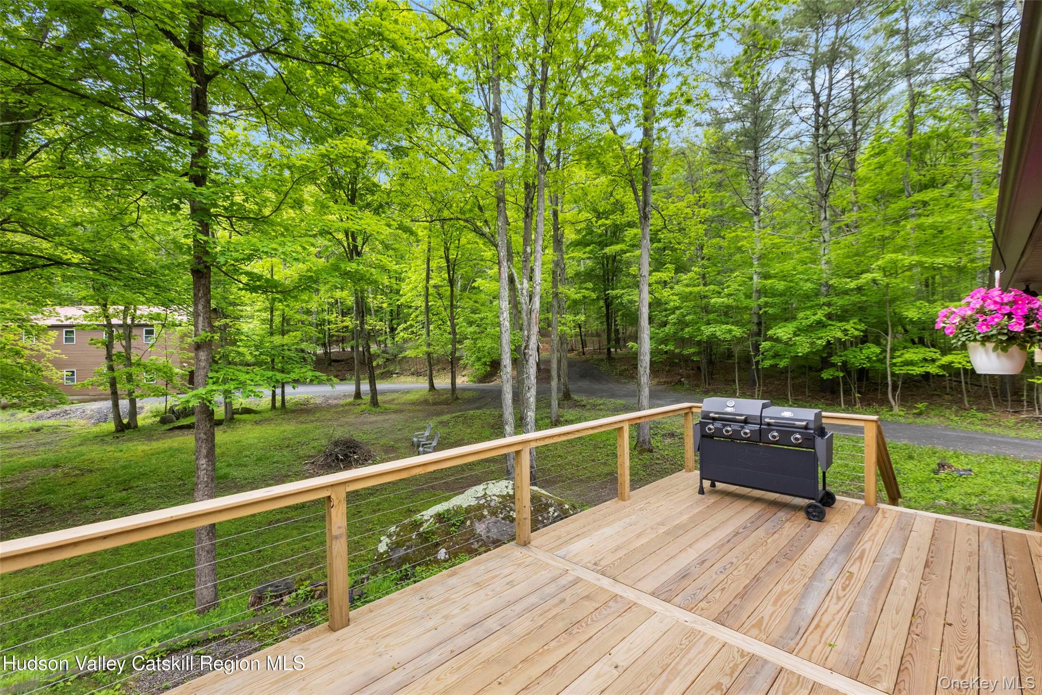 48 Deer Park Road Cairo, NY 12473 - Photo 18 of 33 a view of a deck with chair and tables