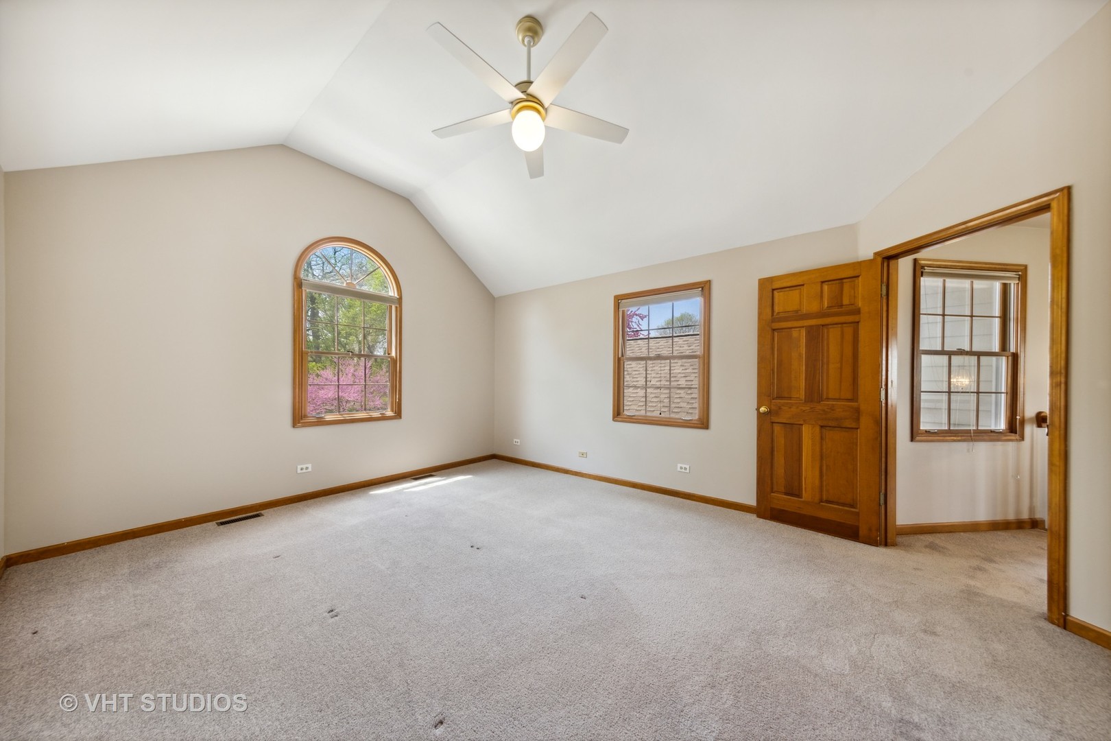 S023 Quail Run Court Winfield, IL 60190 - Photo 14 of 25 an empty room with windows and chandelier fan