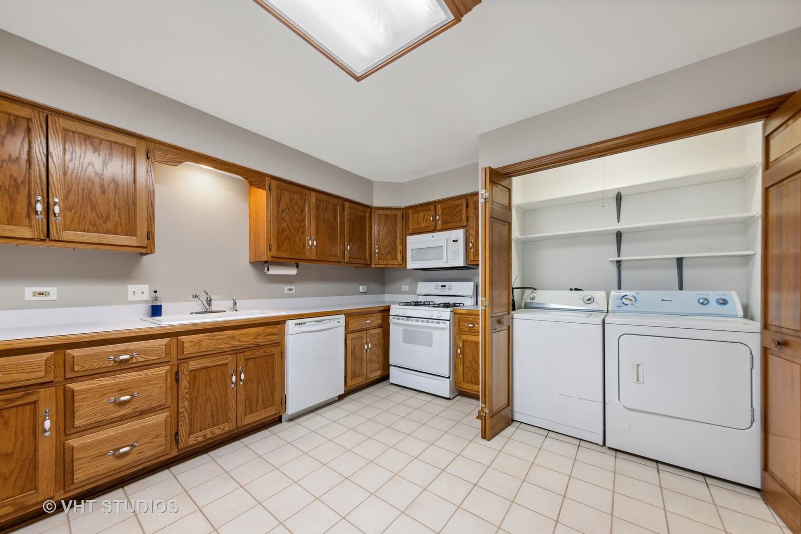 S023 Quail Run Court Winfield, IL 60190 - Photo 19 of 25 a kitchen with sink and cabinets