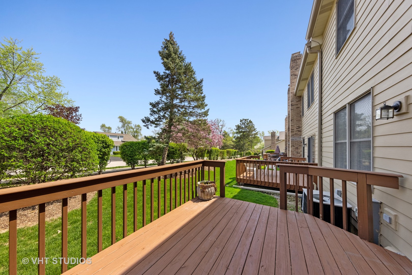 S023 Quail Run Court Winfield, IL 60190 - Photo 20 of 25 a view of a wooden deck with large trees