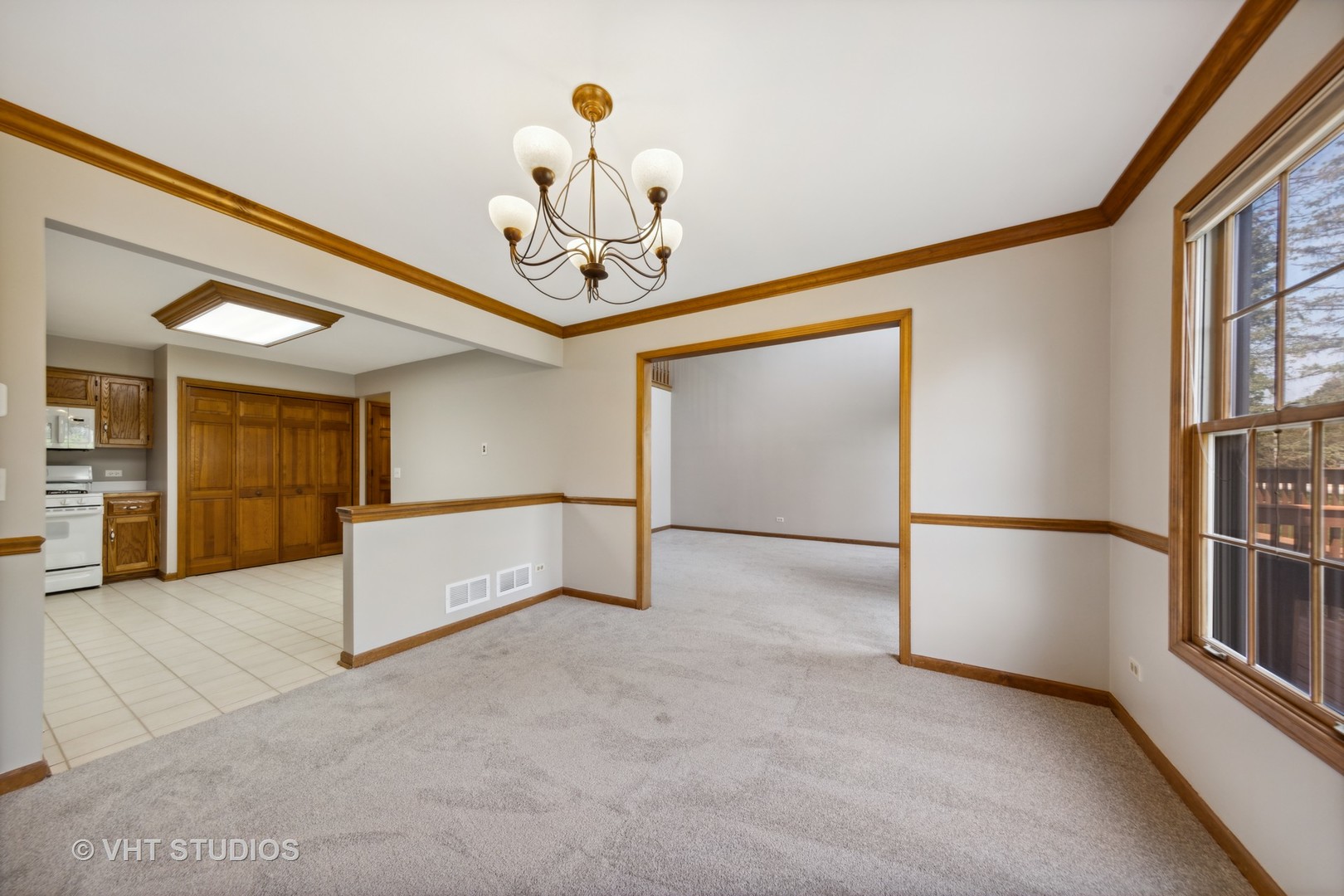 S023 Quail Run Court Winfield, IL 60190 - Photo 9 of 25 a view of a livingroom with a staircase