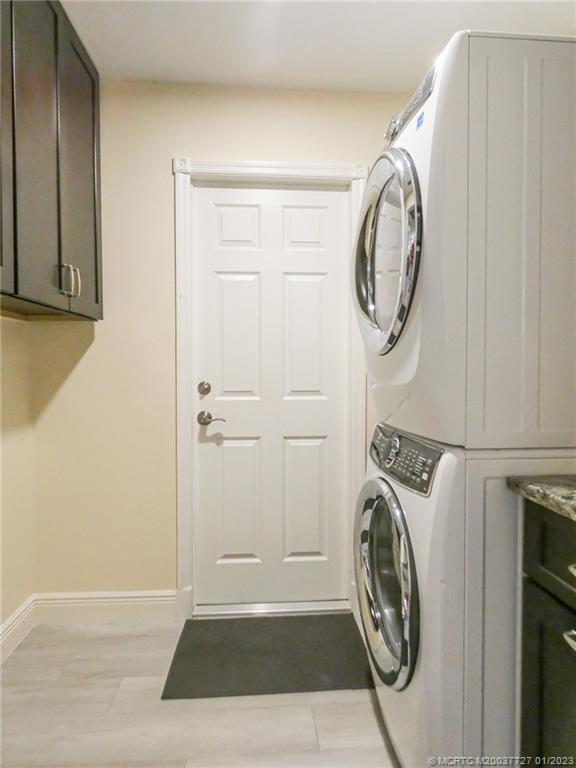 308 Southwest Ridge Lane Stuart, FL 34994 - Photo 31 of 43 a view of a storage and utility room with washer and dryer