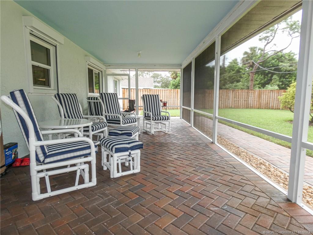 308 Southwest Ridge Lane Stuart, FL 34994 - Photo 33 of 43 a view of a deck with chairs and couches with wooden floor