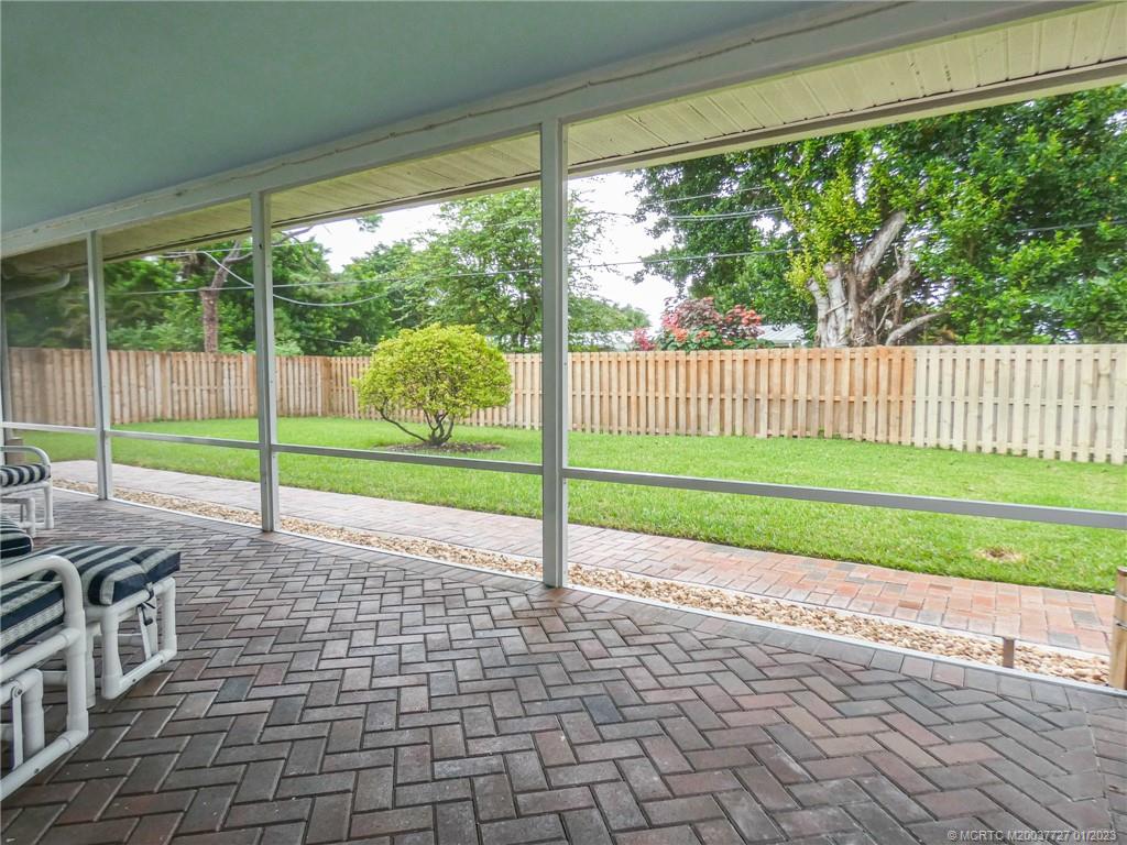 308 Southwest Ridge Lane Stuart, FL 34994 - Photo 35 of 43 a view of a house with a backyard