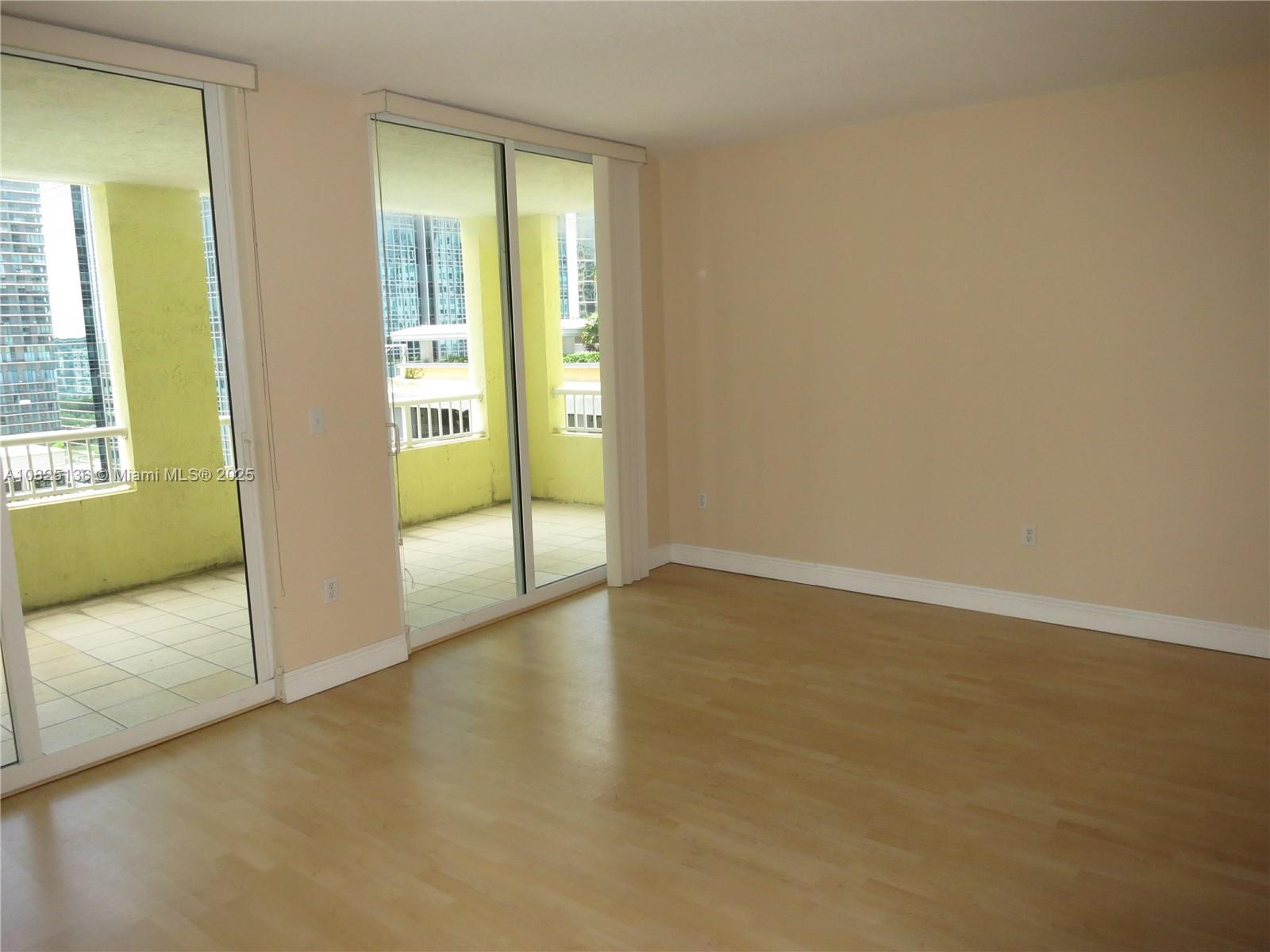 170 Southeast 14th Street, Unit 1407 Miami, FL 33131 - Photo 25 of 25 a view of an empty room and window