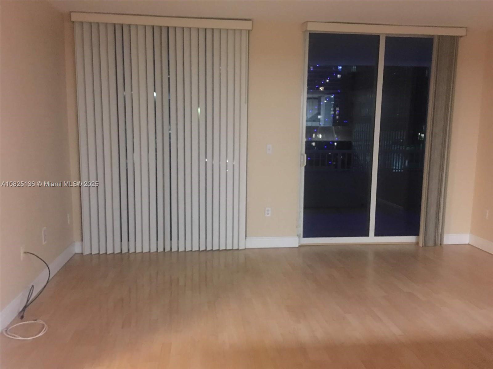 170 Southeast 14th Street, Unit 1407 Miami, FL 33131 - Photo 5 of 25 an empty room with closet