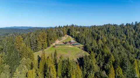 a view of lake with green space