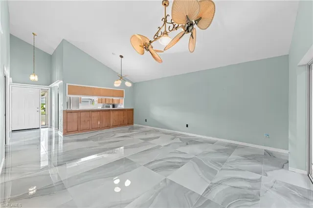 a view of a livingroom with wooden floor