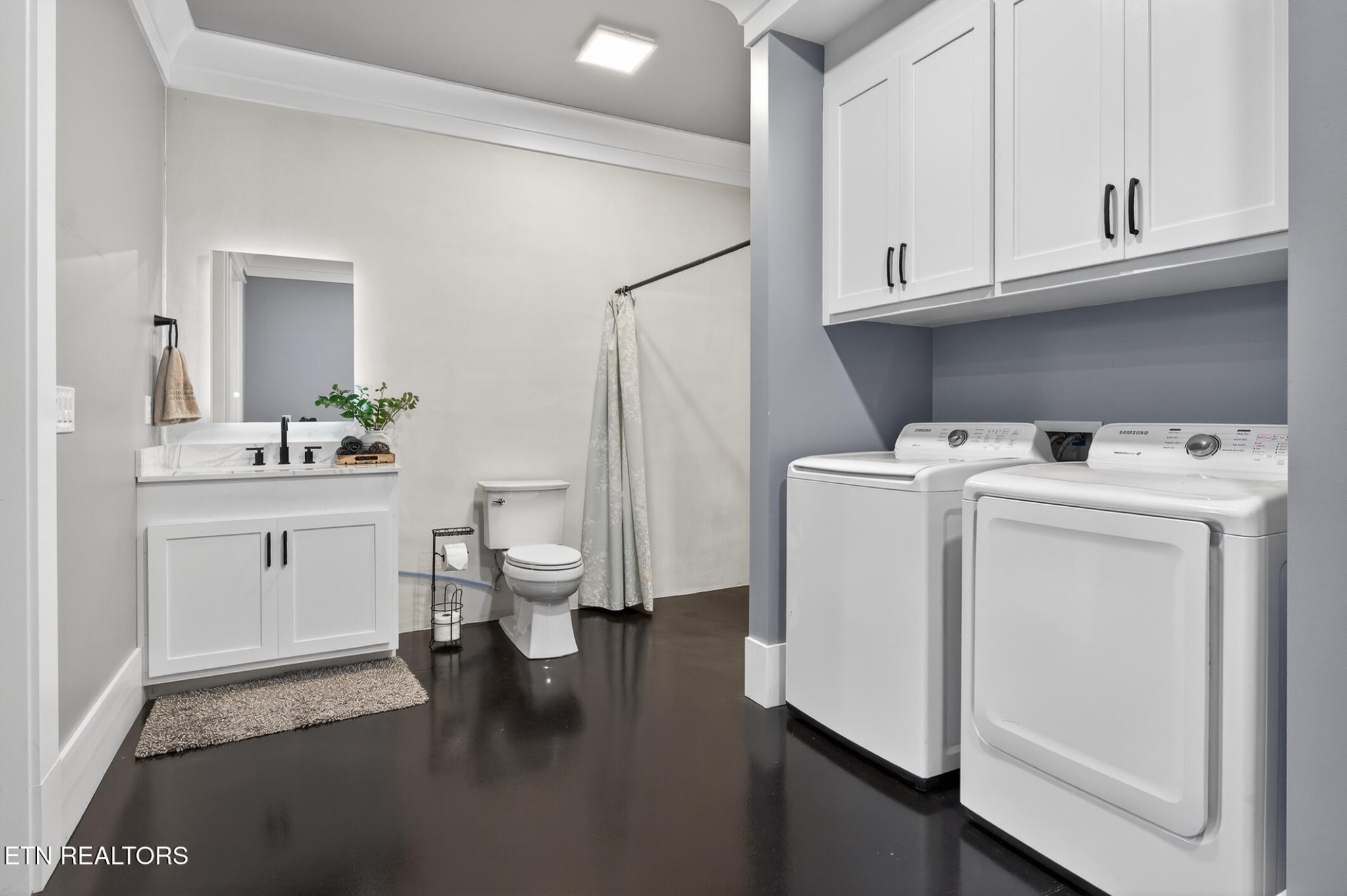 6161 Hiawatha Road Morristown, TN 37814 - Photo 12 of 48 a room with white cabinets and washer