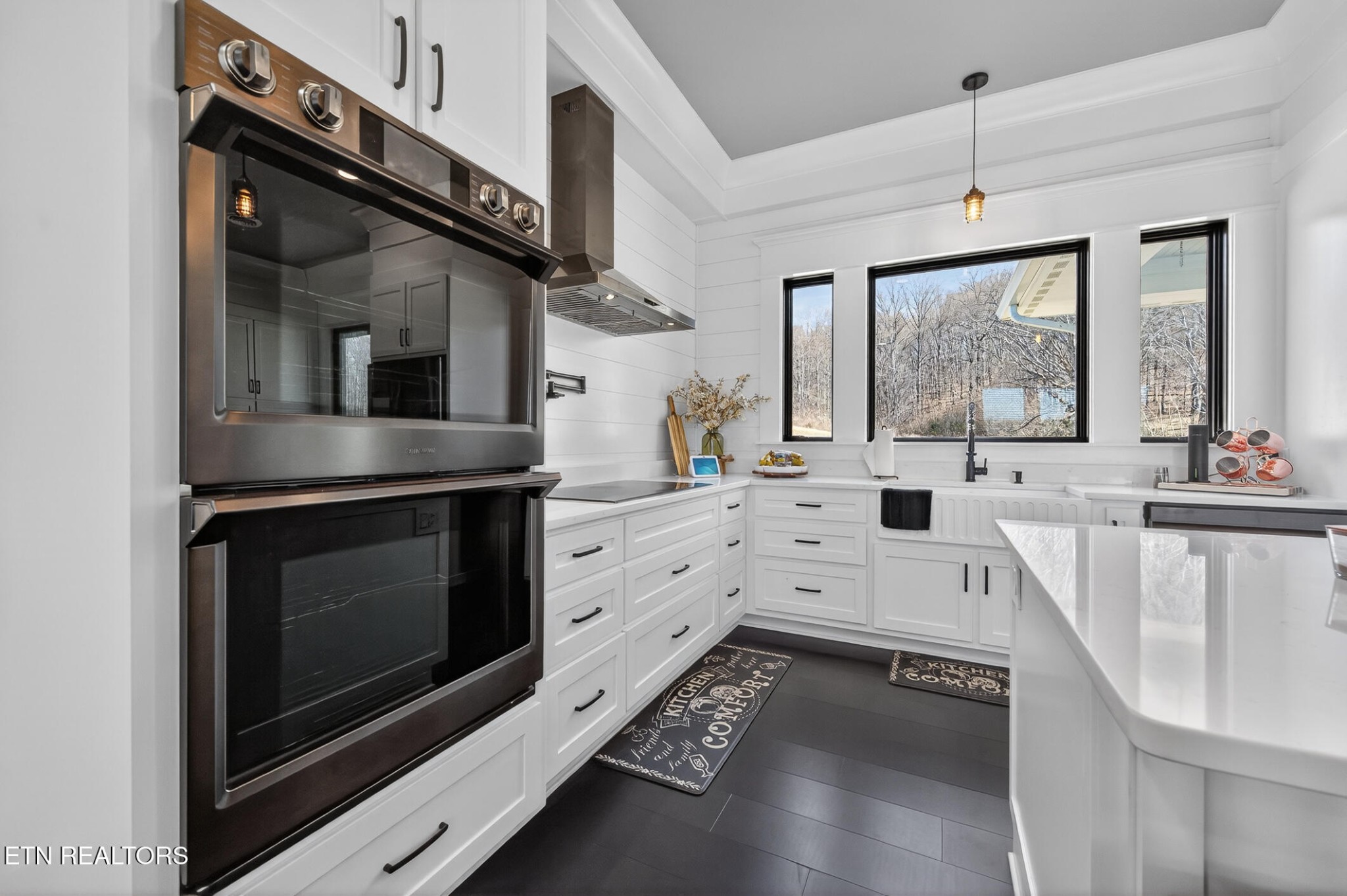 6161 Hiawatha Road Morristown, TN 37814 - Photo 15 of 48 a kitchen with stainless steel appliances a stove sink and cabinets