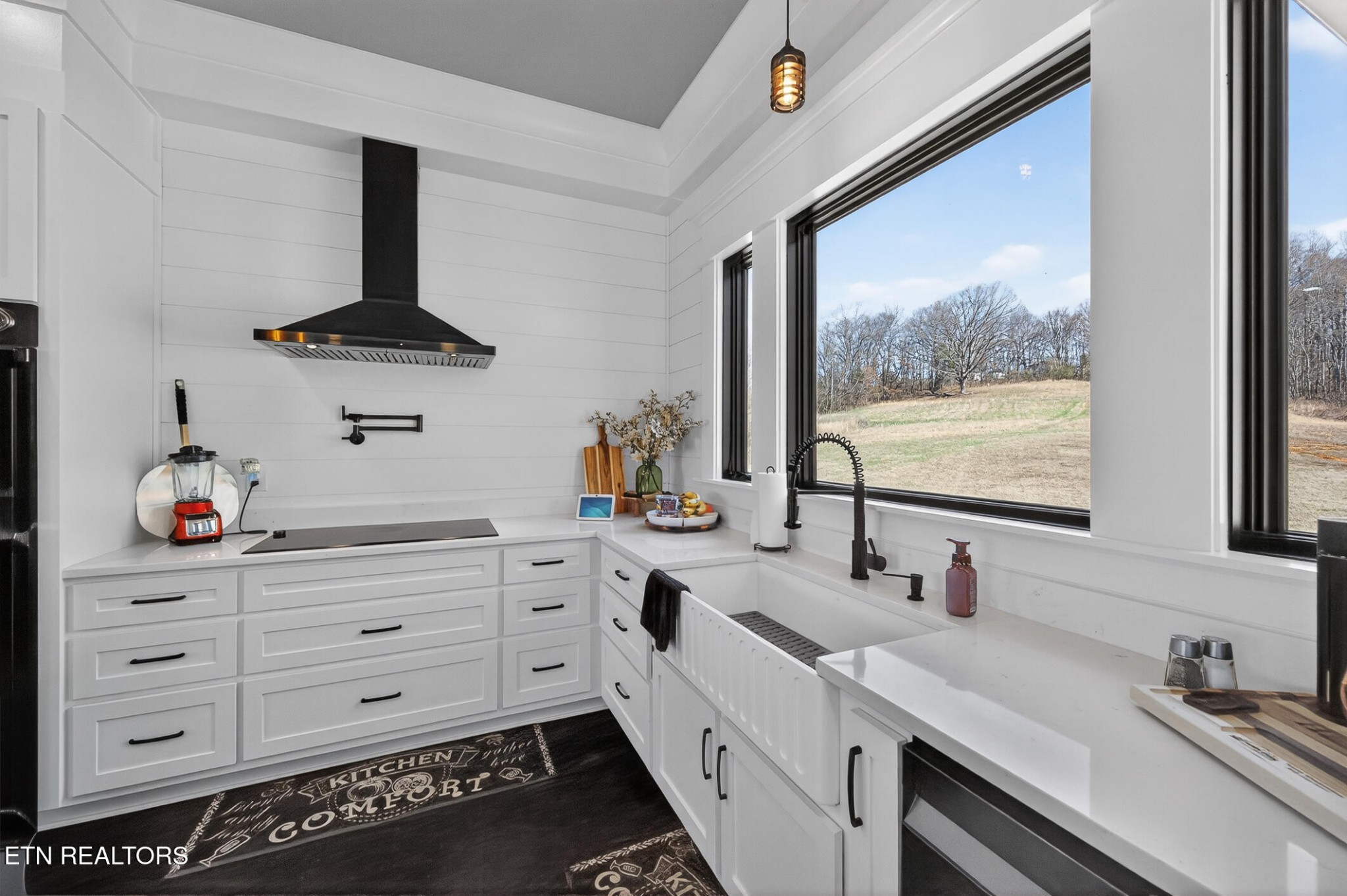 6161 Hiawatha Road Morristown, TN 37814 - Photo 21 of 48 a kitchen with cabinets stainless steel appliances and a window