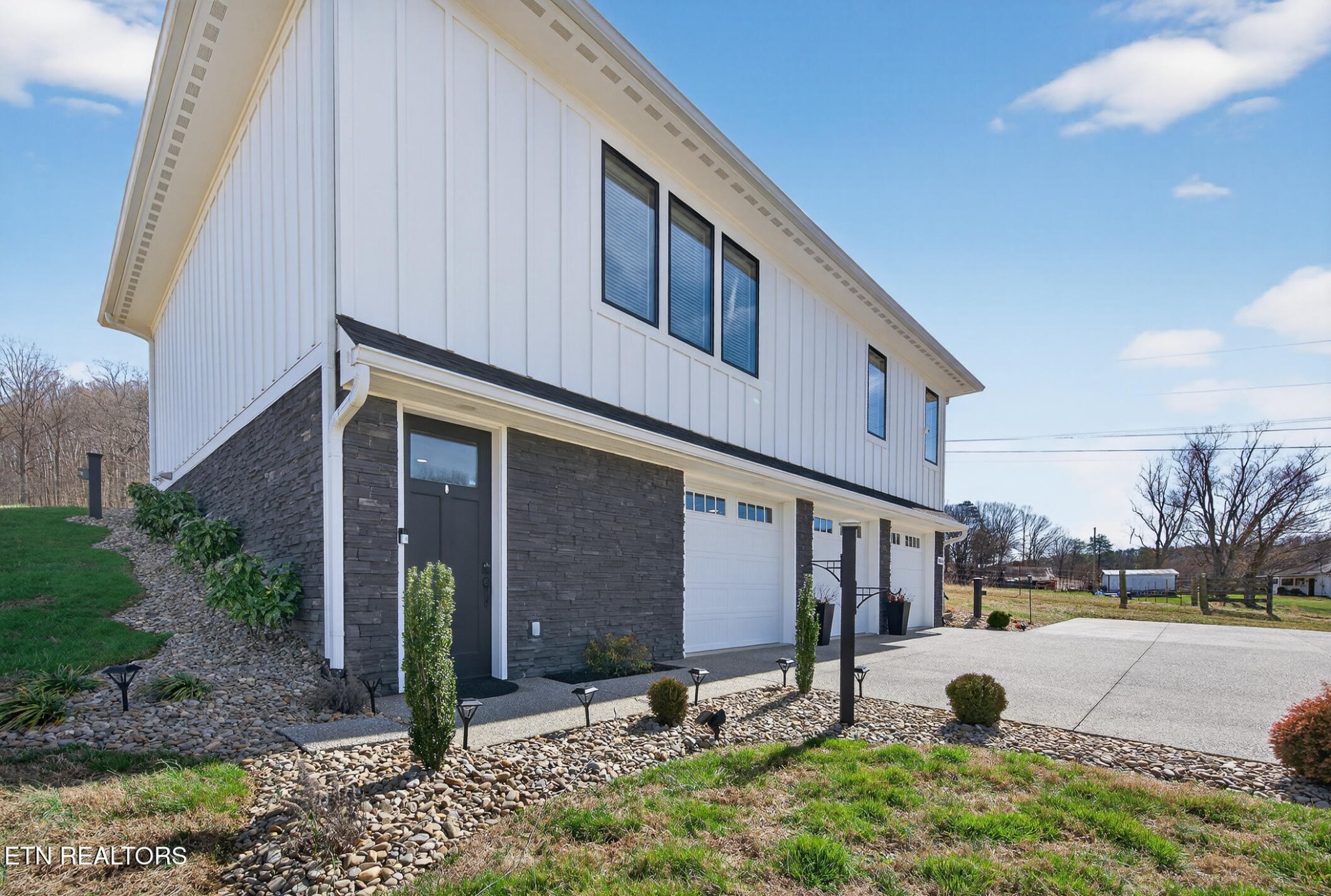 6161 Hiawatha Road Morristown, TN 37814 - Photo 40 of 48 a street view with couple of cars parked in front of building