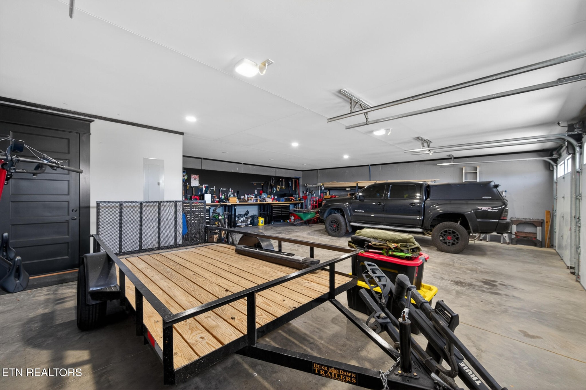6161 Hiawatha Road Morristown, TN 37814 - Photo 8 of 48 a view of a livingroom with furniture and a garage
