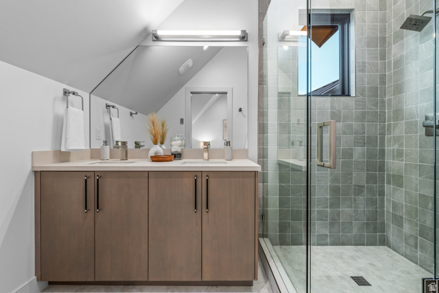 1258 Rothwell Road Park City, UT 84060 - Photo 15 of 48 Bathroom featuring a dual-sink vanity with light-toned cabinetry and a light countertop