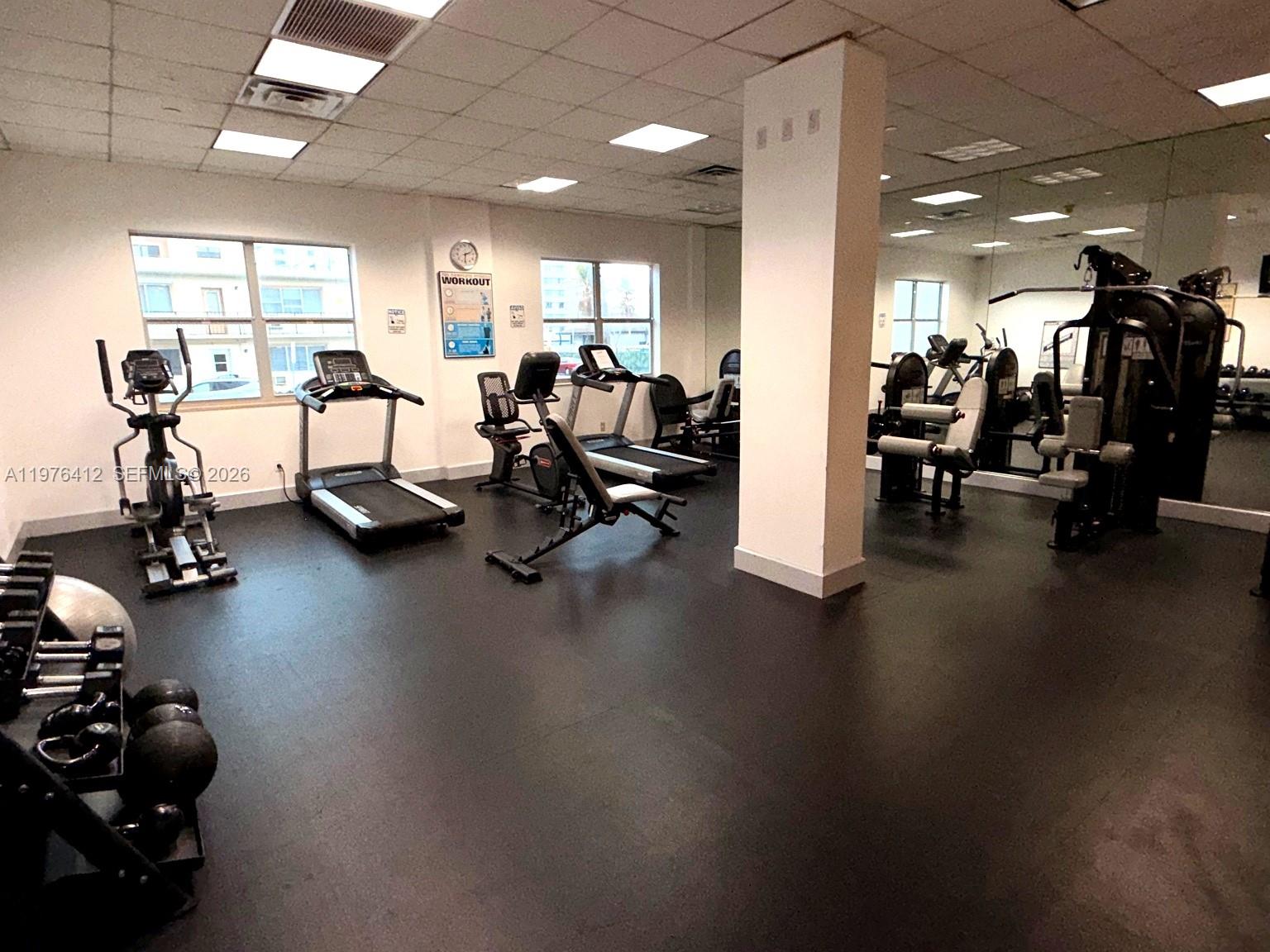 401 69th Street, Unit 405 Miami Beach, FL 33141 - Photo 18 of 20 a view of a room with gym equipment