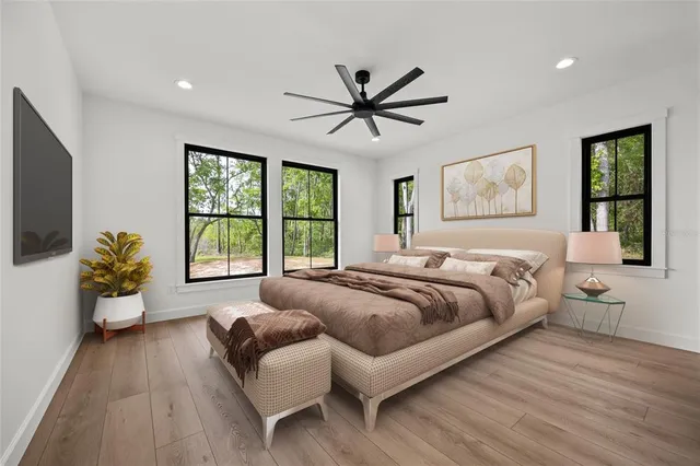 a spacious bathroom with a double vanity sink and a mirror