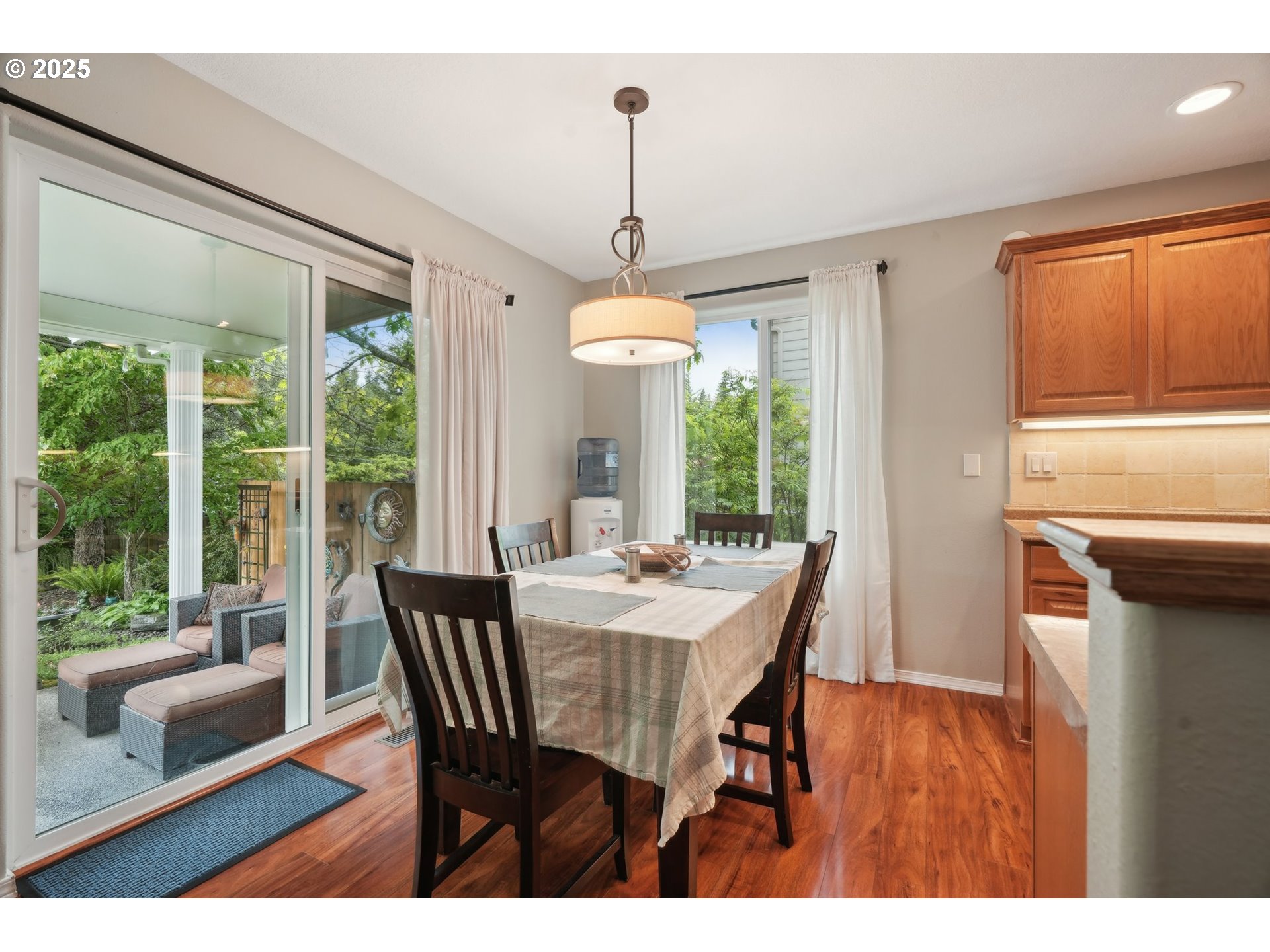 4709 Southeast Antelope Hills Gresham, OR 97080 - Photo 19 of 48 a dining room with furniture window wooden floor