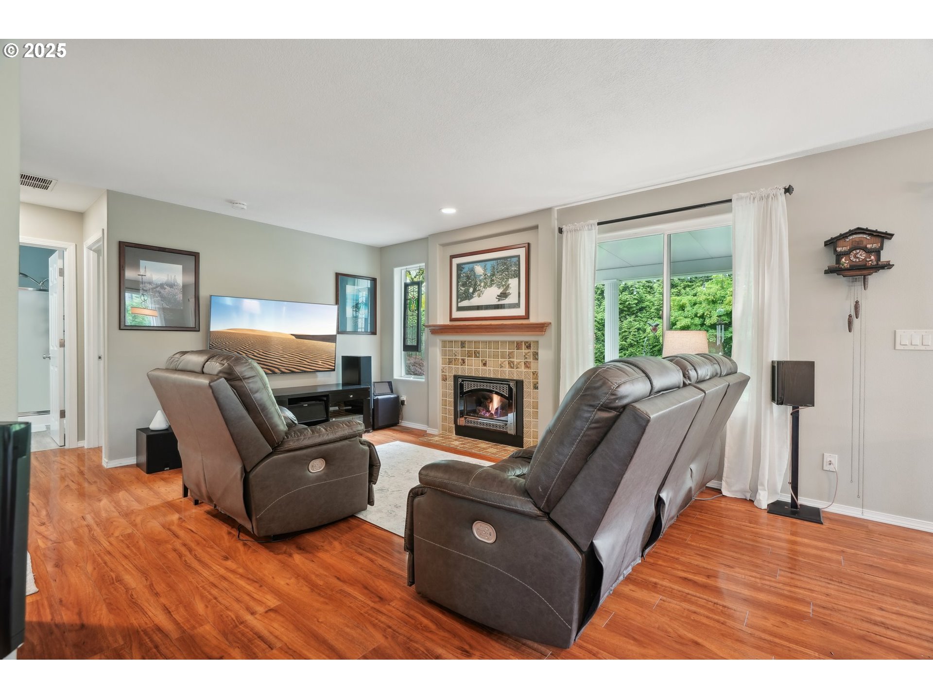 4709 Southeast Antelope Hills Gresham, OR 97080 - Photo 22 of 48 a living room with furniture and a fireplace
