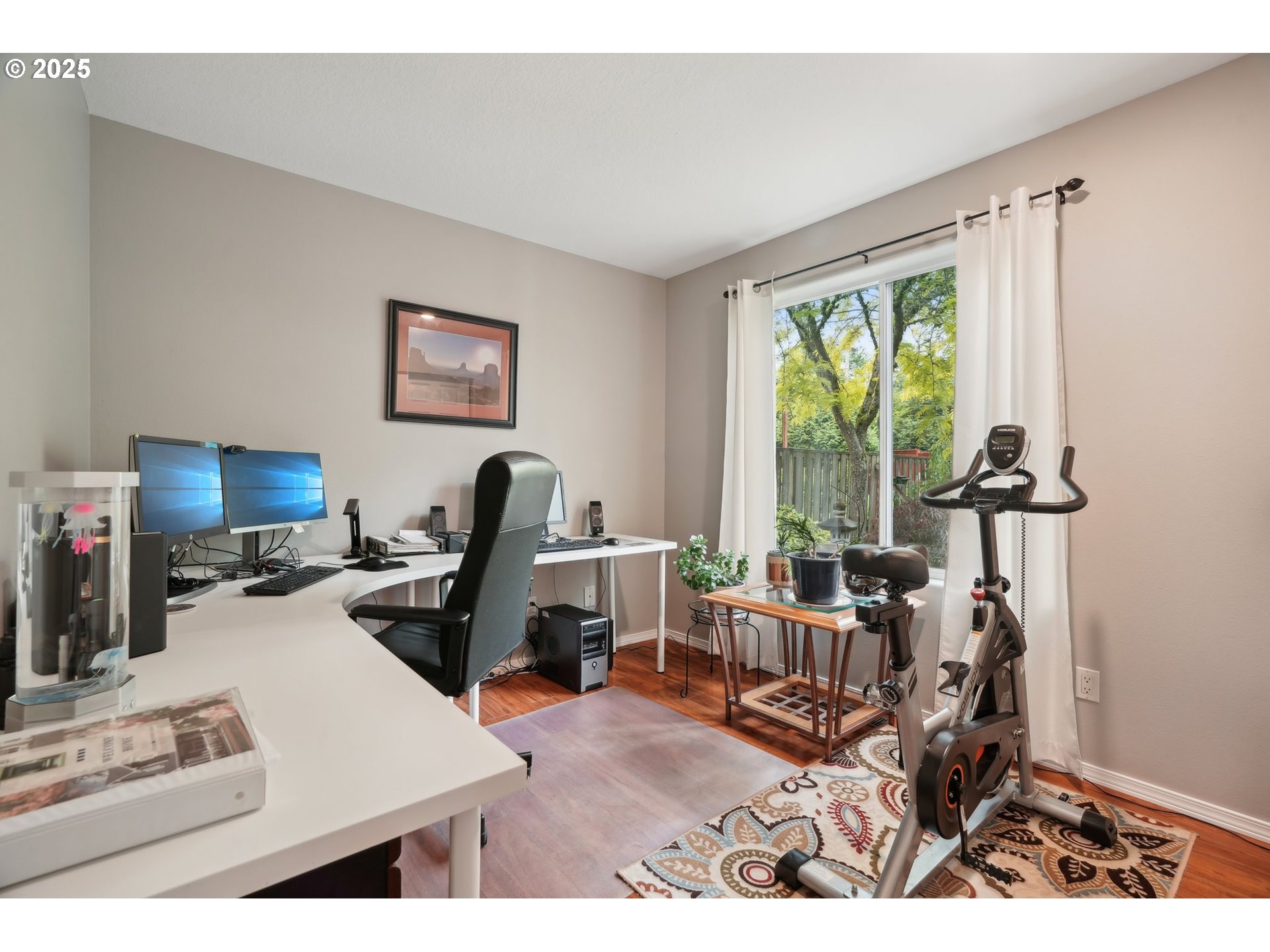 4709 Southeast Antelope Hills Gresham, OR 97080 - Photo 24 of 48 a living room with furniture a large window and a flat screen tv