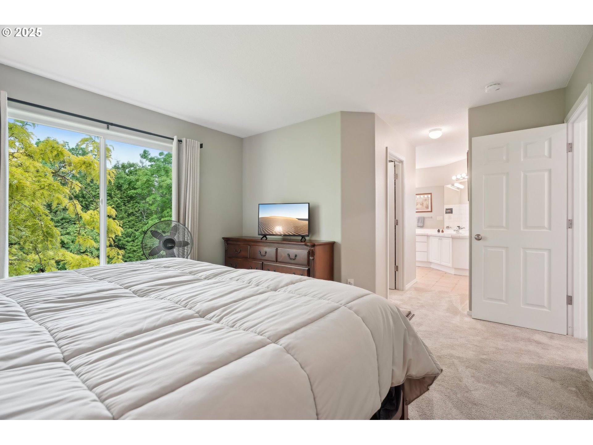 4709 Southeast Antelope Hills Gresham, OR 97080 - Photo 28 of 48 a bedroom with a bed and a window