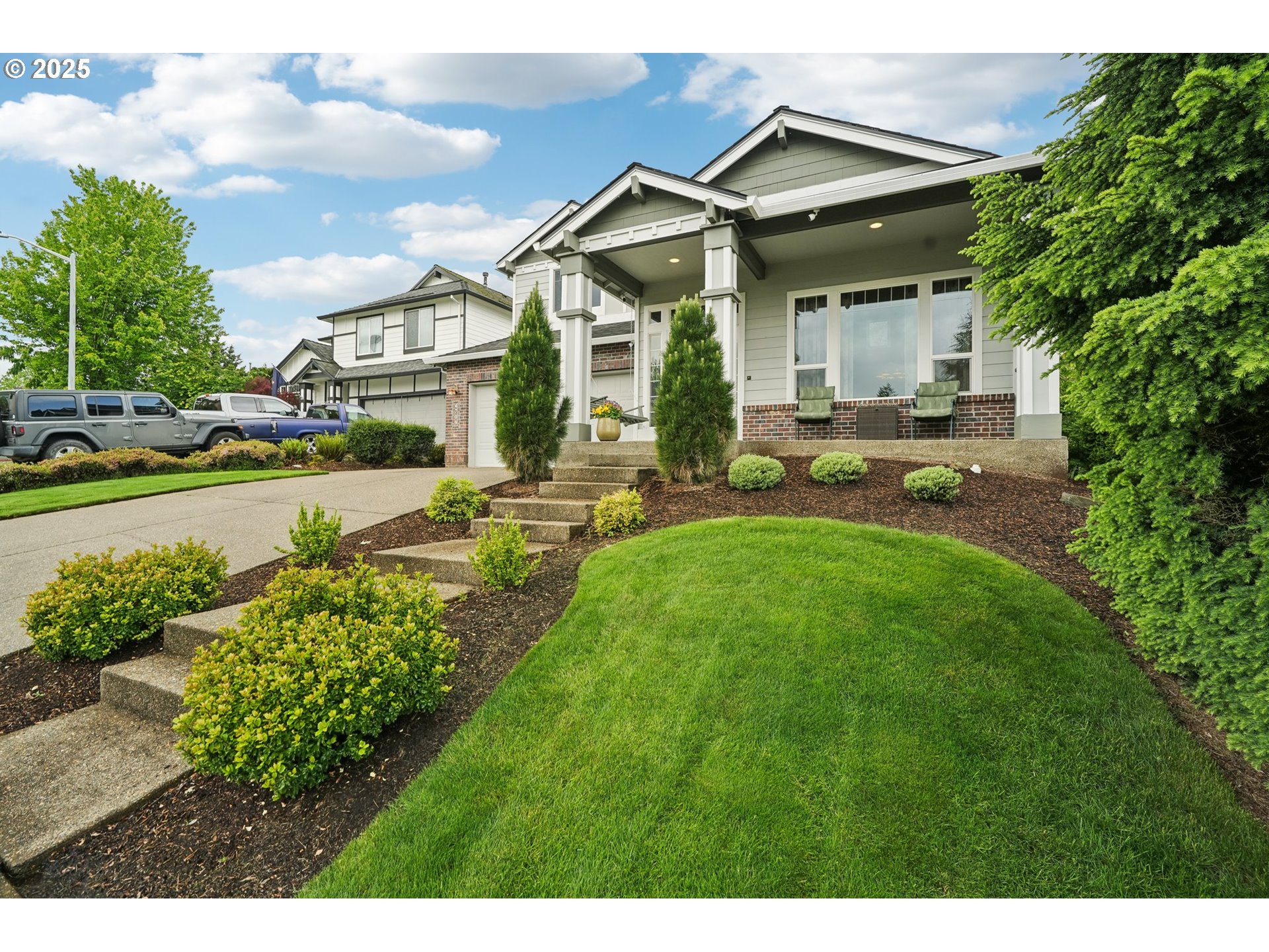 4709 Southeast Antelope Hills Gresham, OR 97080 - Photo 3 of 48 a view of a house with backyard and sitting area