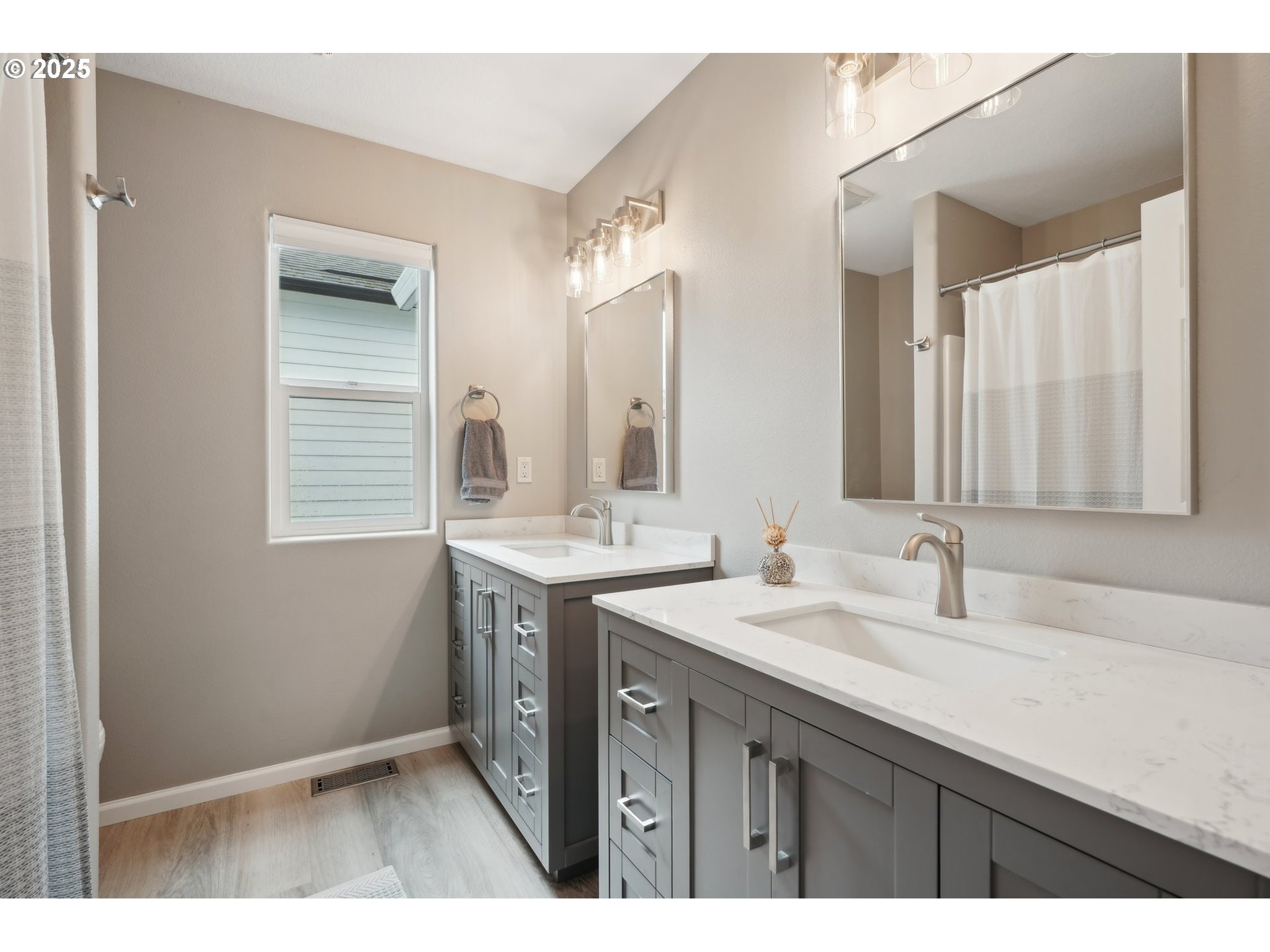 4709 Southeast Antelope Hills Gresham, OR 97080 - Photo 34 of 48 a bathroom with a granite countertop sink and a mirror