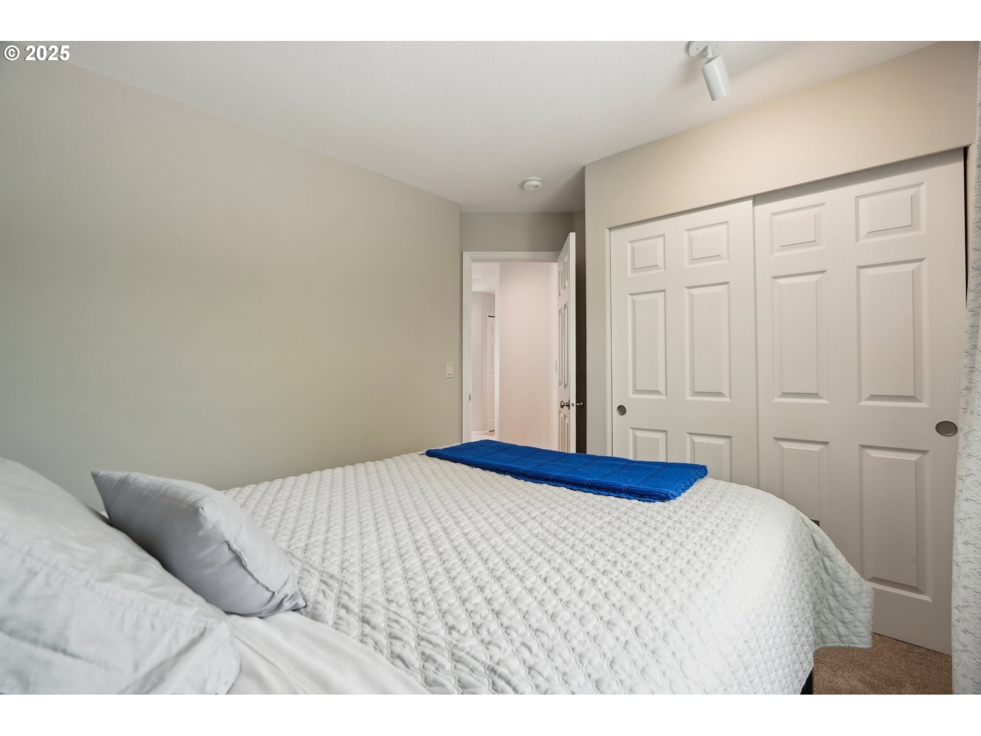 4709 Southeast Antelope Hills Gresham, OR 97080 - Photo 39 of 48 a bedroom with a bed and a cabinet