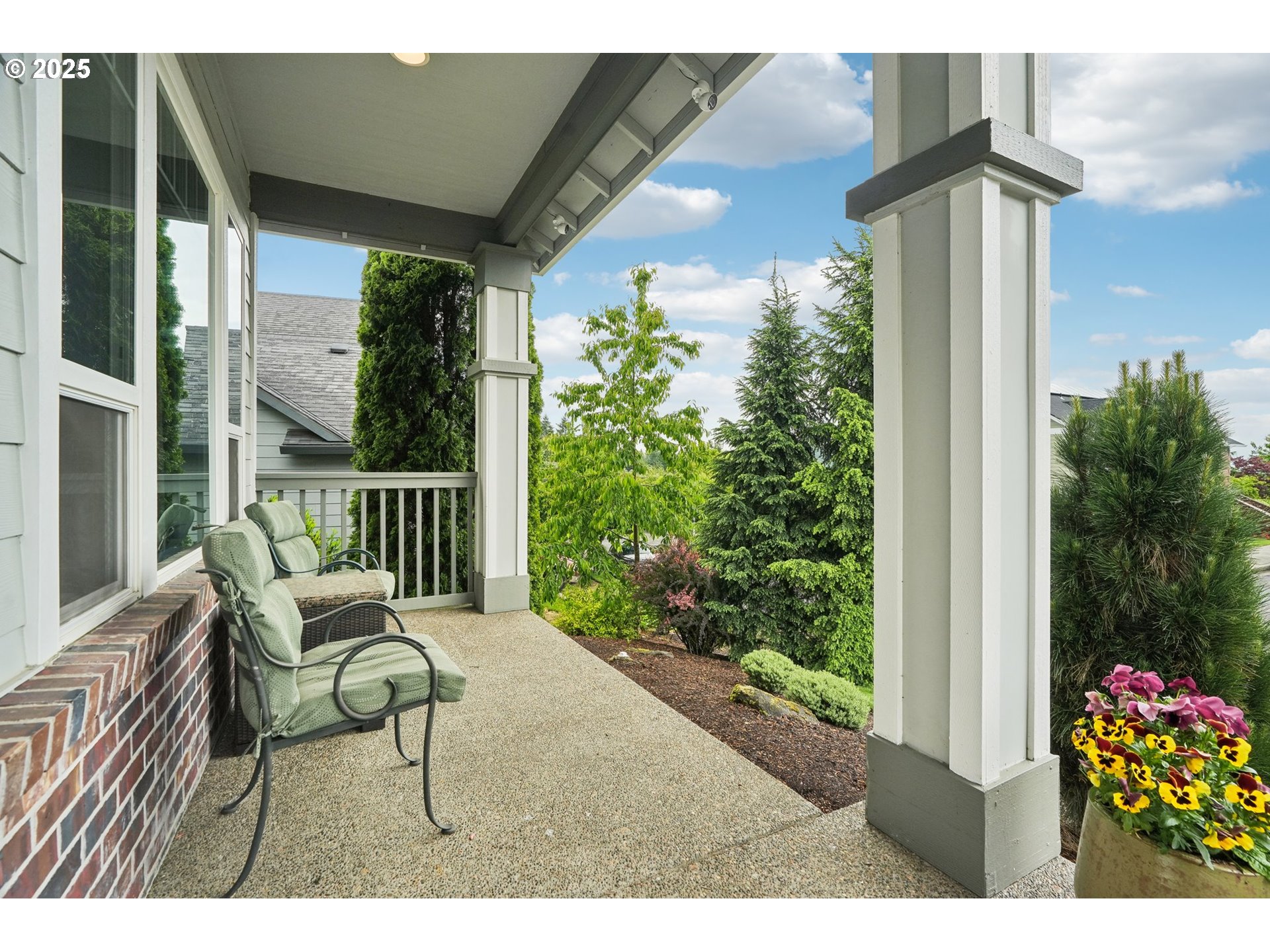4709 Southeast Antelope Hills Gresham, OR 97080 - Photo 4 of 48 a view of a chair and table in the balcony