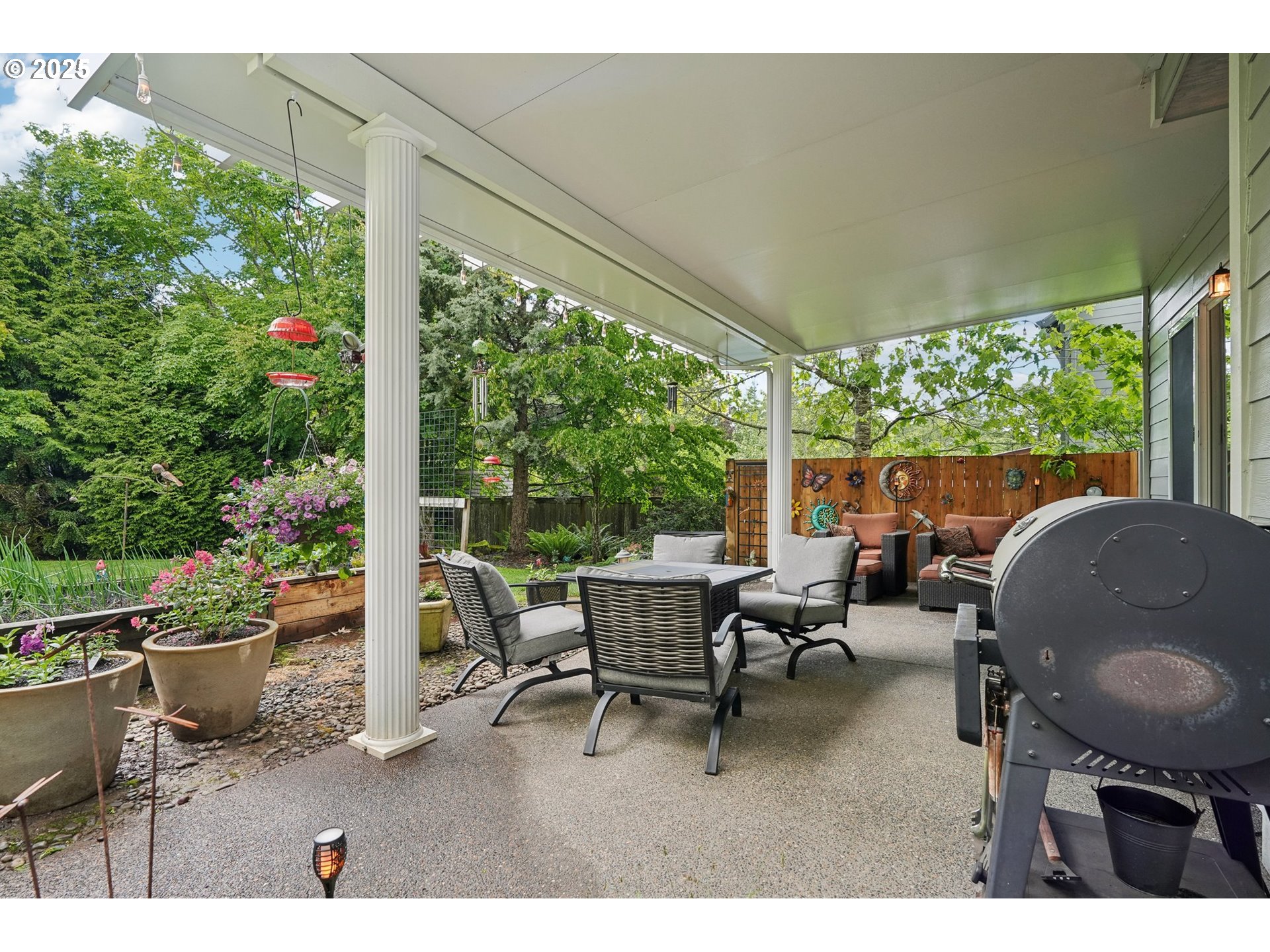 4709 Southeast Antelope Hills Gresham, OR 97080 - Photo 41 of 48 a living room with patio furniture and potted plants